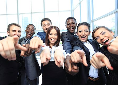 Successful business people with thumbs up and smiling Stock Photo - Budget Royalty-Free & Subscription, Code: 400-07838636