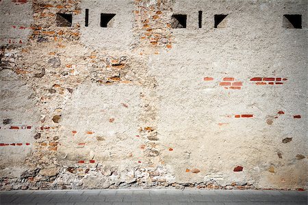 simsearch:400-05947515,k - Aged weathered street wall with some small windows Photographie de stock - Aubaine LD & Abonnement, Code: 400-07838653