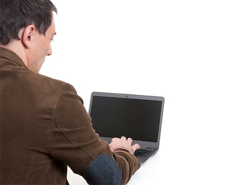 Young handsome businessman with a laptop. From above Stock Photo - Budget Royalty-Free & Subscription, Code: 400-07839756