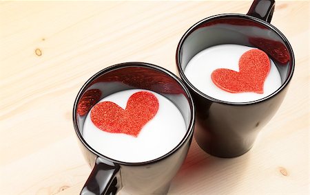 simsearch:400-04546601,k - two cup of milk with decorative hearts on wood table with space for text, concept of valentine day Foto de stock - Royalty-Free Super Valor e Assinatura, Número: 400-07839800