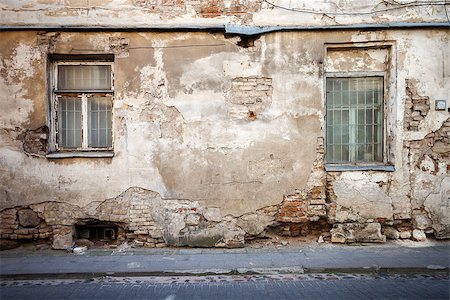 simsearch:400-05947515,k - Aged weathered street wall with some windows Photographie de stock - Aubaine LD & Abonnement, Code: 400-07839853
