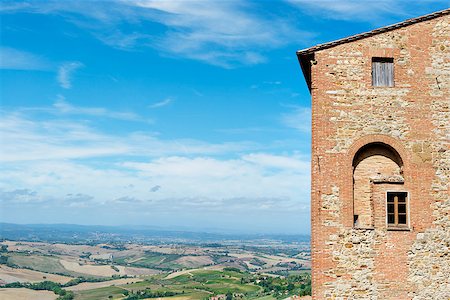 View from Montepulciano Tuscany, Italy, to lanscape with blue sky in summer Stock Photo - Budget Royalty-Free & Subscription, Code: 400-07831241