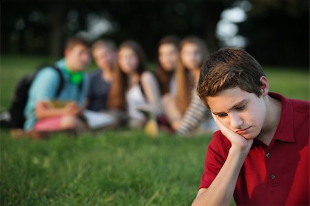 peer pressure - Sulking male caucasian teen with face in hands Foto de stock - Super Valor sin royalties y Suscripción, Código: 400-07831431