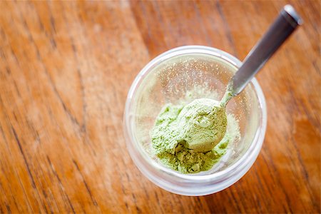 Green tea powder in glass, Stockbilder - Microstock & Abonnement, Bildnummer: 400-07831441