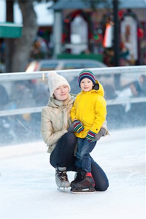 family of two having fun ice skating together at winter Stock Photo - Budget Royalty-Free & Subscription, Code: 400-07831496