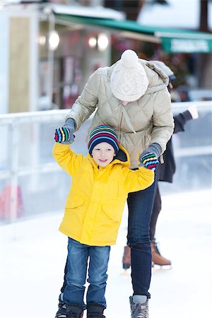 simsearch:400-08034847,k - family of two having fun ice skating together at winter Photographie de stock - Aubaine LD & Abonnement, Code: 400-07831500