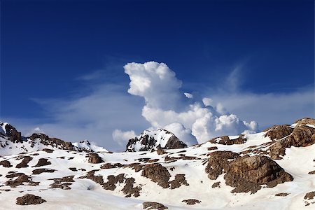 simsearch:400-07215536,k - Snowy rocks and sky with clouds at nice day. Turkey, Central Taurus Mountains, Aladaglar (Anti Taurus) view from plateau Edigel (Yedi Goller) Foto de stock - Super Valor sin royalties y Suscripción, Código: 400-07831811
