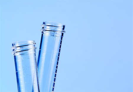 simsearch:400-07774098,k - detail of the test tubes in laboratory on blue light tint background Stock Photo - Budget Royalty-Free & Subscription, Code: 400-07831951