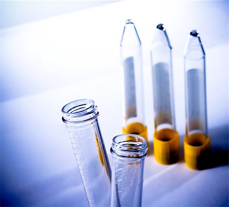 simsearch:400-07774098,k - detail of the test tubes in laboratory on table and blue light tint background Stock Photo - Budget Royalty-Free & Subscription, Code: 400-07831952