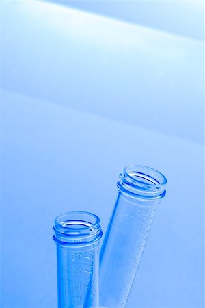 simsearch:400-07774098,k - empty test tubes in laboratory on table and blue light tint background Stock Photo - Budget Royalty-Free & Subscription, Code: 400-07831953