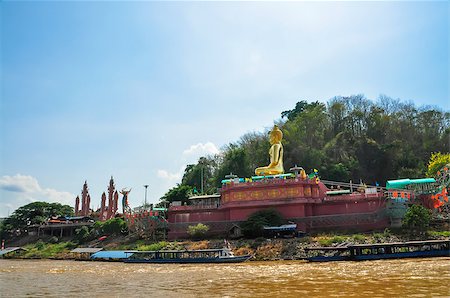 Beautiful Golden Buddha statue, at public temple, Wat Phabuddha navarantur - Golden Triangle in Chiang Rai,Thailand. Stock Photo - Budget Royalty-Free & Subscription, Code: 400-07832258