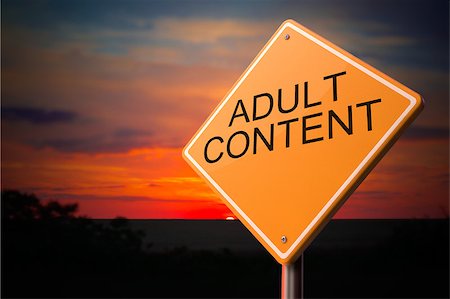 porão - Adult Content on Warning Road Sign on Sunset Sky Background. Stock Photo - Budget Royalty-Free & Subscription, Code: 400-07840121