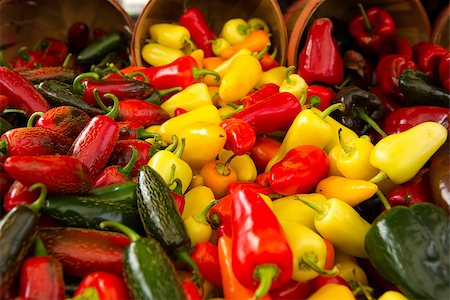 person with hot pepper - Organic peppers from a local market Stock Photo - Budget Royalty-Free & Subscription, Code: 400-07894187
