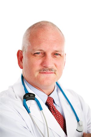 simsearch:400-05192323,k - Portrait of a handsome, mature medical doctor looking friendly but serious.  White background Stock Photo - Budget Royalty-Free & Subscription, Code: 400-07894530
