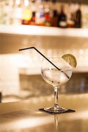 a cup of gin tonic with lemon on bar Stock Photo - Budget Royalty-Free & Subscription, Code: 400-07894689