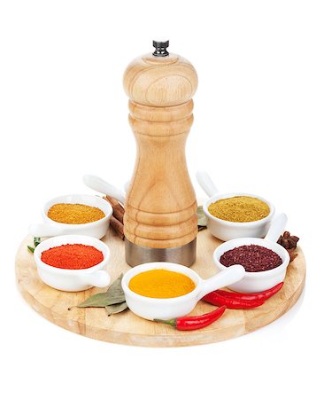 simsearch:400-08053136,k - Various spices selection on cutting board. Isolated on white background Photographie de stock - Aubaine LD & Abonnement, Code: 400-07894935