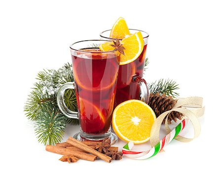 Christmas mulled wine with spices and snowy fir tree. Isolated on white background Stock Photo - Budget Royalty-Free & Subscription, Code: 400-07894974