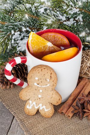 Christmas mulled wine with fir tree, gingerbread and spices on wooden table Stock Photo - Budget Royalty-Free & Subscription, Code: 400-07894975