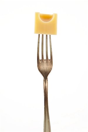 emmentaler cheese - Emmental piece on fork isolated on white background. Stock Photo - Budget Royalty-Free & Subscription, Code: 400-07895343
