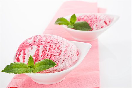 double scoop - Tasty cherry ice cream in white bowl decorated with mit leaf. Summer food styling. Stock Photo - Budget Royalty-Free & Subscription, Code: 400-07895352