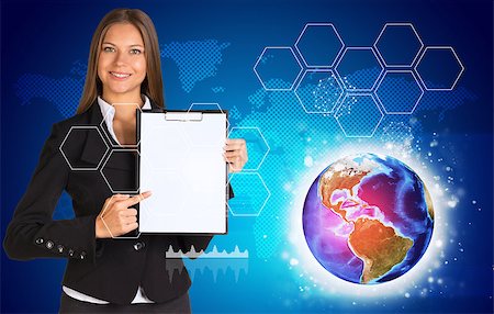 simsearch:400-07895693,k - Beautiful businesswoman in suit holding paper holder. World map, Earth and hexagons in background. Elements of this image furnished by NASA Stock Photo - Budget Royalty-Free & Subscription, Code: 400-07895690