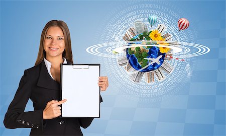 simsearch:400-07895693,k - Beautiful businesswoman in suit holding paper holder. Earth with buildings and figures in background. Elements of this image furnished by NASA Stock Photo - Budget Royalty-Free & Subscription, Code: 400-07895701