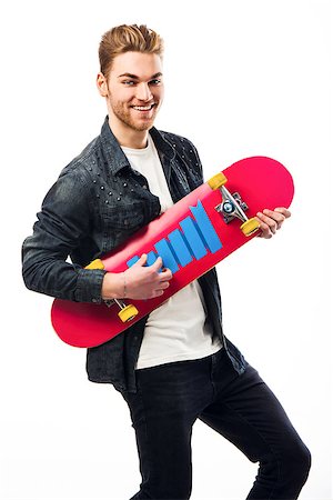 simsearch:400-08694289,k - Studio portrait of a young man posing with a skateboard Stock Photo - Budget Royalty-Free & Subscription, Code: 400-07896666