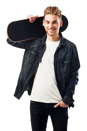 Studio portrait of a young man posing with a skateboard Stock Photo - Budget Royalty-Free & Subscription, Code: 400-07896668