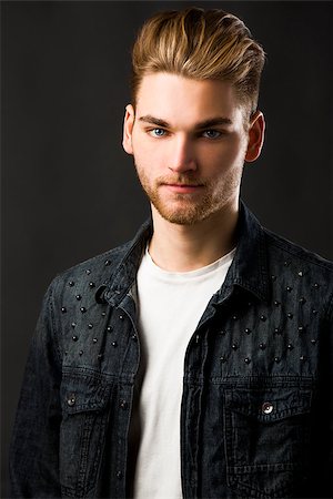 Studio portrait of a young fashion man Stock Photo - Budget Royalty-Free & Subscription, Code: 400-07896675