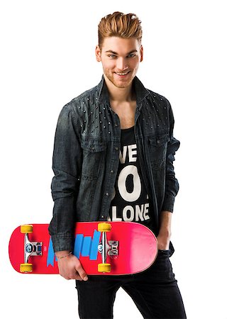 Studio portrait of a young man posing with a skateboard Stock Photo - Budget Royalty-Free & Subscription, Code: 400-07896680