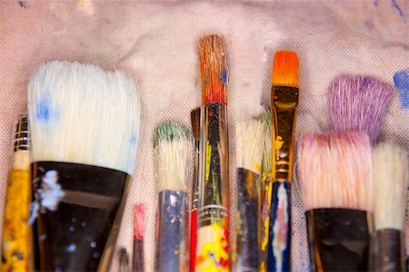 painter palette photography - collection of various artists brushes in all sizes on a canvas background Stock Photo - Budget Royalty-Free & Subscription, Code: 400-07897482