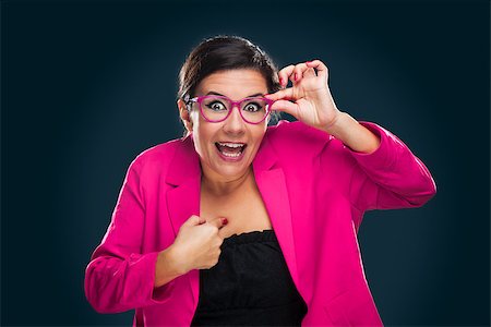 funny looking girls with glasses - Middle aged woman with a happy face holding her own glasses and pointing to herself Stock Photo - Budget Royalty-Free & Subscription, Code: 400-07897707