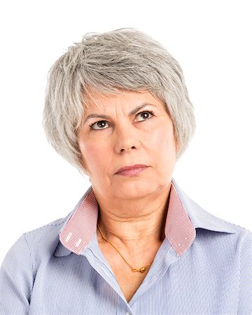 simsearch:400-06107800,k - Portrait of a elderly woman with a thinking expression Photographie de stock - Aubaine LD & Abonnement, Code: 400-07897771