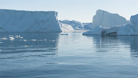Beautiful Icebergs in Greenland with blue Sky Stock Photo - Budget Royalty-Free & Subscription, Code: 400-07897824