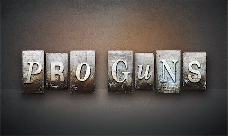 The words PRO GUNS written in vintage letterpress type Stock Photo - Budget Royalty-Free & Subscription, Code: 400-07897942