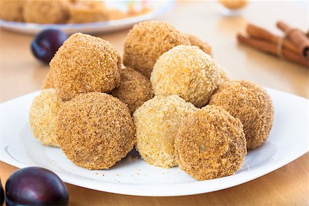 Close up of delicious sweet plum dumplings on white plate Stock Photo - Budget Royalty-Free & Subscription, Code: 400-07898290