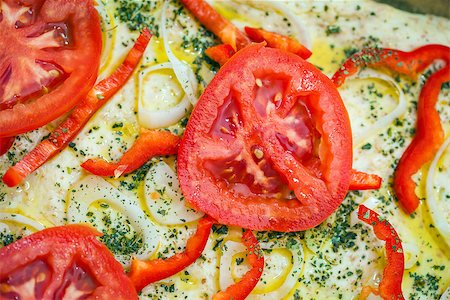 simsearch:400-04376706,k - Tomato slice detail of traditional Italian focaccia bread with red peppers, onions, basil and olive oil on pan ready to cook Stock Photo - Budget Royalty-Free & Subscription, Code: 400-07898293