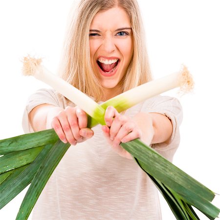 portrait screaming girl - Beautiful blonde woman holding leeks and fighting with them Stock Photo - Budget Royalty-Free & Subscription, Code: 400-07898796