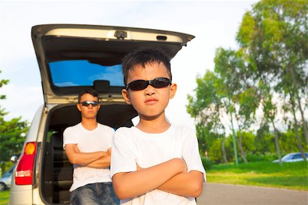 family suv - little boy and father with their car in the park Stock Photo - Budget Royalty-Free & Subscription, Code: 400-07891829