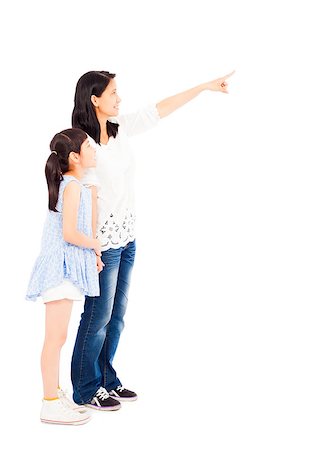 simsearch:400-07517983,k - Happy mother and daughter  looking and pointing over white background Foto de stock - Super Valor sin royalties y Suscripción, Código: 400-07892086