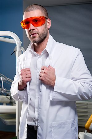 Confident successful doctor at dental clinic Stock Photo - Budget Royalty-Free & Subscription, Code: 400-07892152