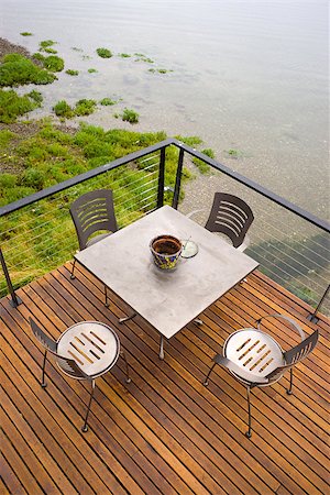 deck chair railing - A deck spans out over the water Stock Photo - Budget Royalty-Free & Subscription, Code: 400-07892244