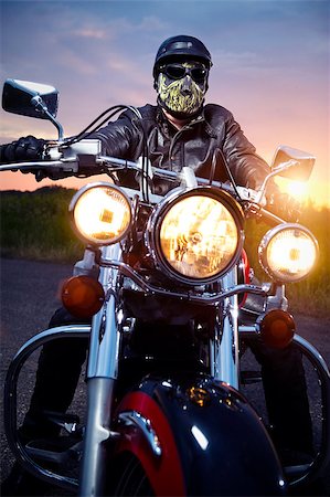 Biker on the motorbike outdoors Stock Photo - Budget Royalty-Free & Subscription, Code: 400-07892260