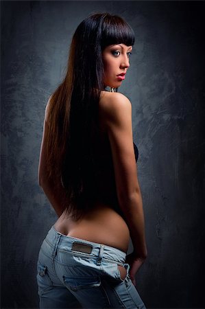 simsearch:400-04956611,k - Young sensual woman in jeans Photographie de stock - Aubaine LD & Abonnement, Code: 400-07892315