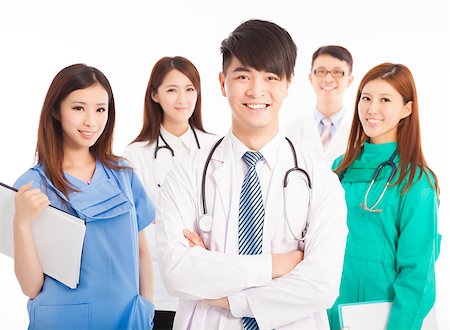 simsearch:400-07412761,k - Professional medical doctor team standing over white background Foto de stock - Royalty-Free Super Valor e Assinatura, Número: 400-07892419