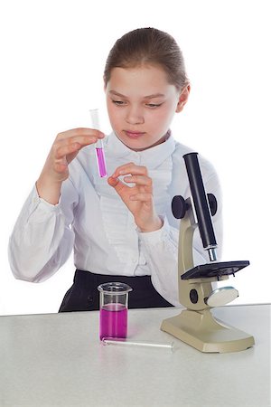 simsearch:625-00899089,k - girl with a microscope and tubes conducts laboratory study. Stockbilder - Microstock & Abonnement, Bildnummer: 400-07893243