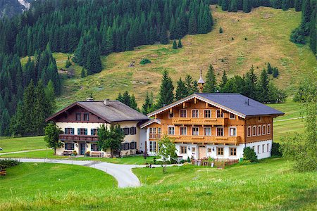 simsearch:400-05905289,k - Dienten am Hochkönig, Austria - August 8, 2013: Beautiful typical mountain guests houses on austrian alps, Austria Stock Photo - Budget Royalty-Free & Subscription, Code: 400-07893654