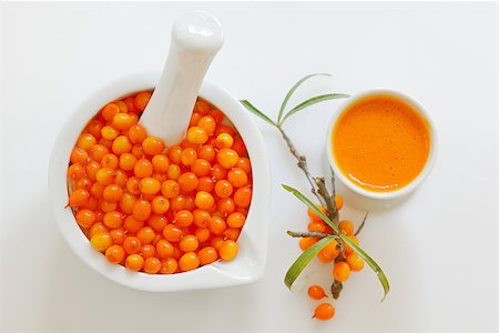 Sea buckthorn juice, juice and berries isolated on white background. Natural detox. Stock Photo - Budget Royalty-Free & Subscription, Code: 400-07893746