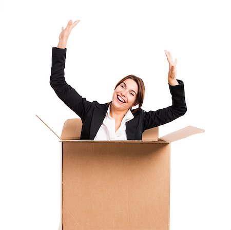 simsearch:400-04343310,k - Happy business woman appear inside a big card box, isolated over white background Photographie de stock - Aubaine LD & Abonnement, Code: 400-07904066