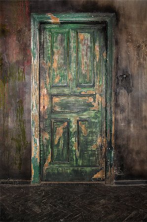 front door closed inside - Closed old wooden door on grunge wall background Stock Photo - Budget Royalty-Free & Subscription, Code: 400-07904234